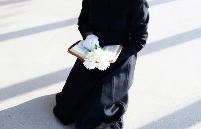 Person reading eulogy