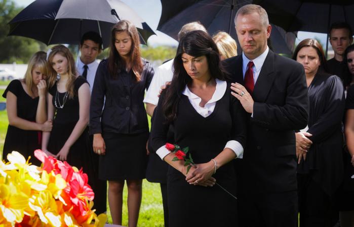 grieving family at a funeral