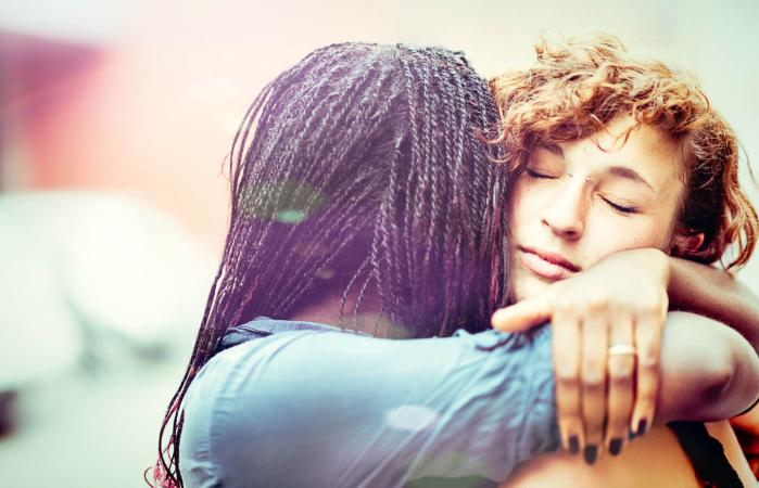woman supporting friend