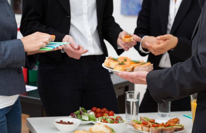 group of people on funeral buffet