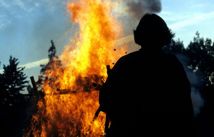 Man's silhouette at funeral pyre