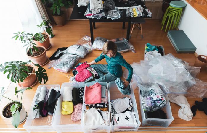 Woman organizes clothes