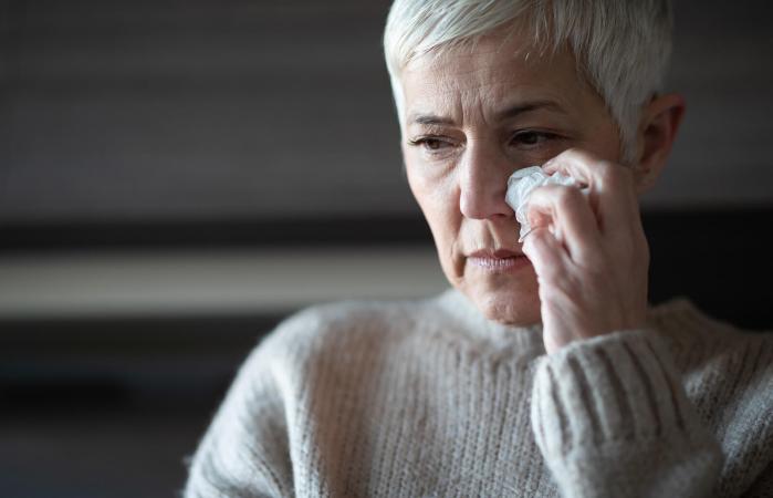 senior woman grieving