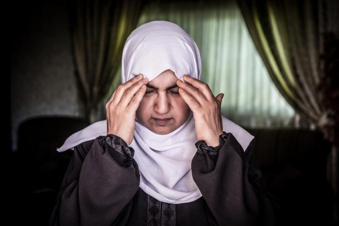 Muslim woman in pain