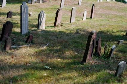 The first settlers in New England were buried in unmarked graves.