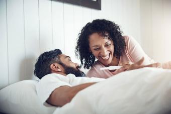 Happy couple after taking pregnancy test