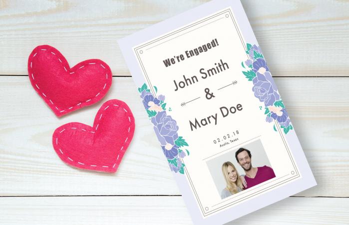 Engagement announcement on wooden table