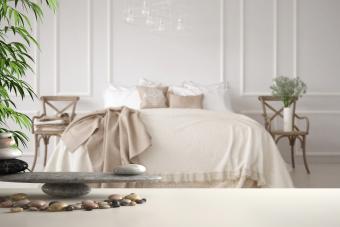 Bedroom with soft bed full of pillows