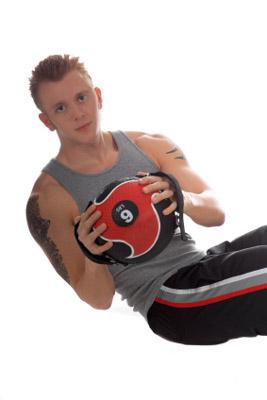 Man working out with medicine ball