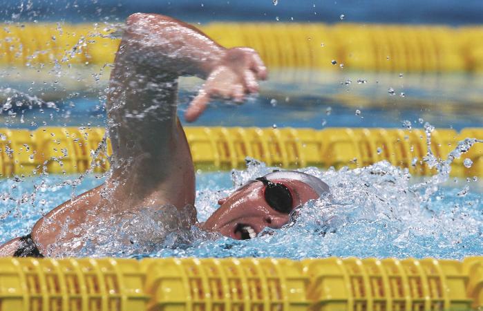 Women swimming freestyle