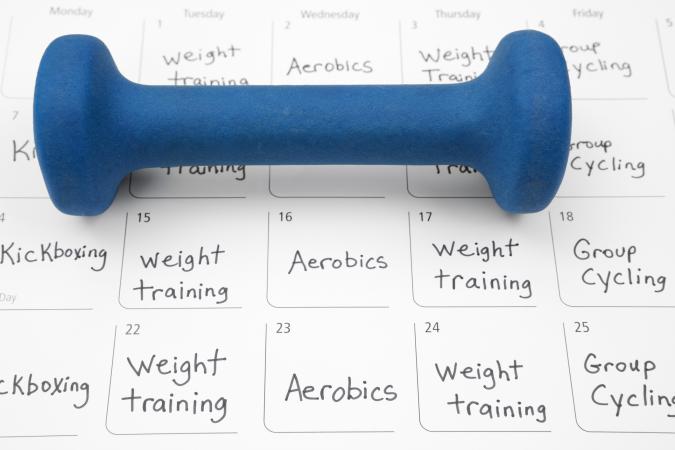 workout schedule and hand weight