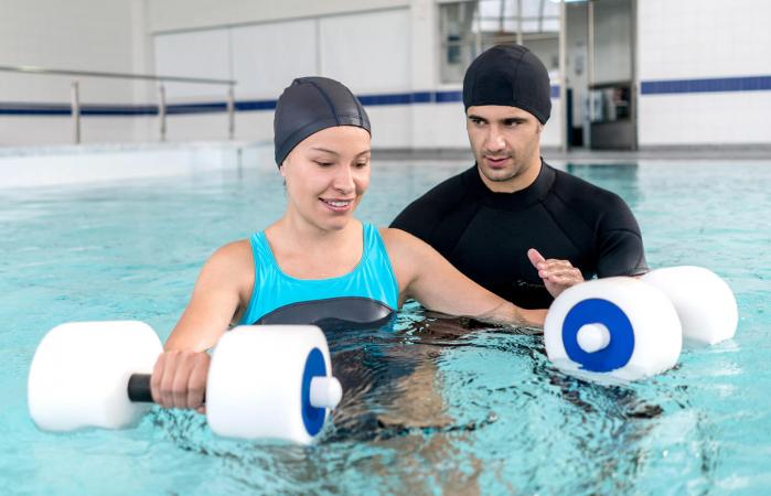 Woman doing physical therapy in the water