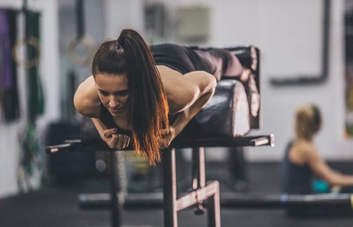 Woman doing low back exercise