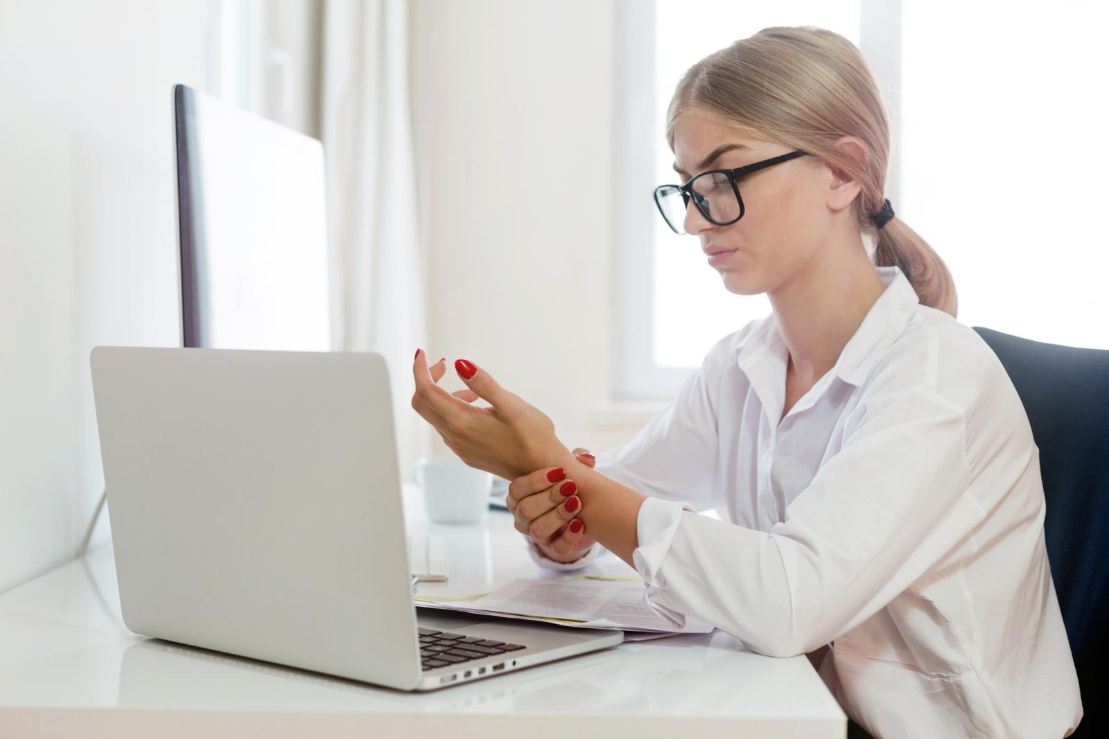 Young woman wrist pain