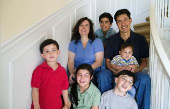 family sitting on a staircase 