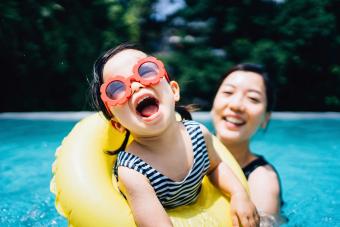 happy toddler girl with sunglasses