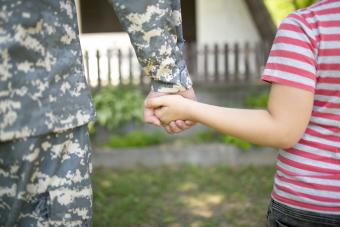 Military father and child together