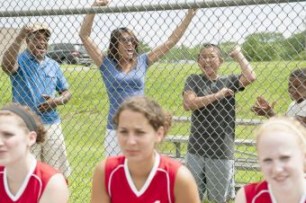 Families Cheering Teen Softball Players