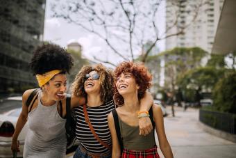 Three girlfriends having fun in the city