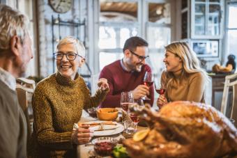 woman talking to her husband during Thanksgiving