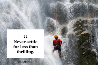 Climber in waterfall