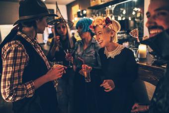 People drinking in a bar in Halloween