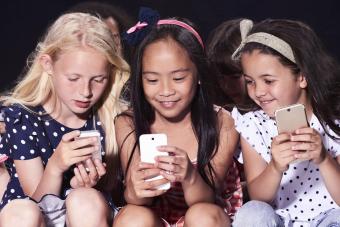 Group of friends using their phones