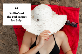 Woman in a red towel at the beach