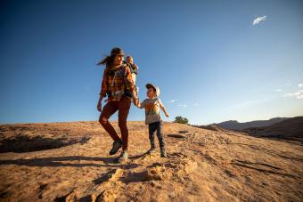 A mother and hiking with her two kids