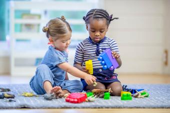 Toddlers Playing with Toys