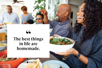 Multigenerational family enjoy meal together on patio