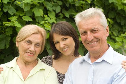 Elderly parents with adult child