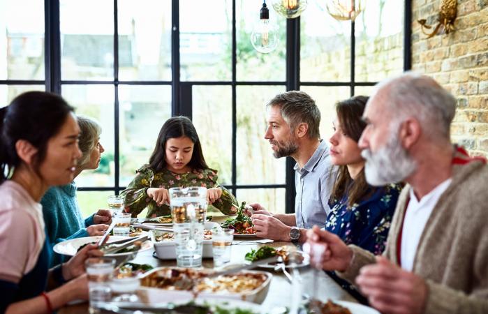 family enjoying dinner together