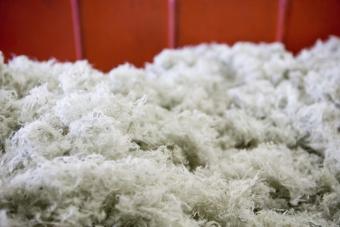 Polyester fibers obtained after PVC
