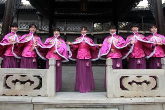 Tour guides in new winter clothes with embroidery in late Qing Dynasty - Getty Editorial Use