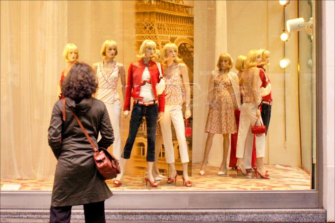 Woman looking at window display