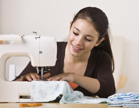 Young Girl Sewing
