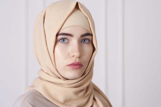 Woman wearing head veil