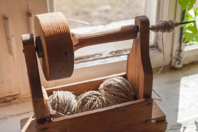 Ancient wooden tool for hand spinning