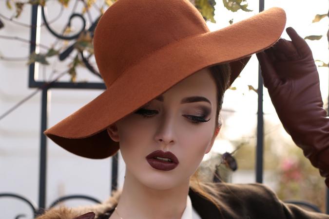 Woman wearing felt hat