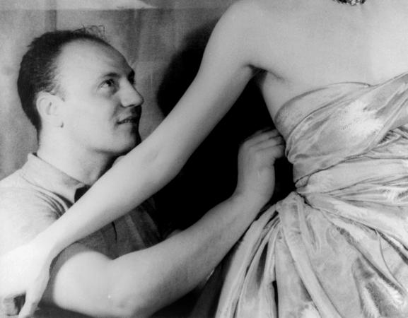 Pierre Balmain fitting haute couture gown on actress Ruth Ford.
