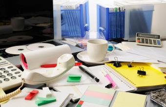 Cluttered office desk