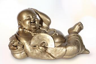 Statuette of Hotei (Buddha) with a fan 