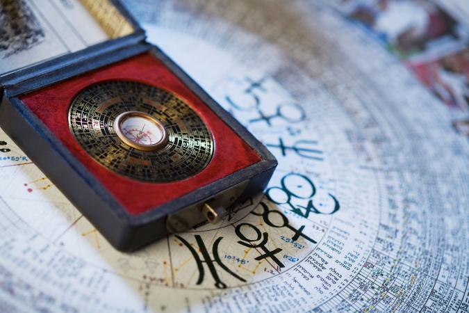 Feng Shui Compass over Chinese Calendar