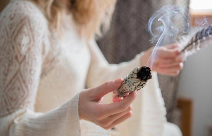 woman with ritual incense