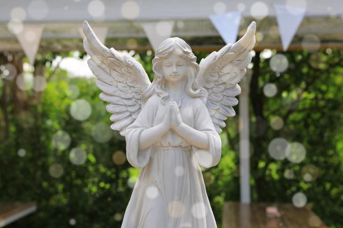 White angel statue in the garden