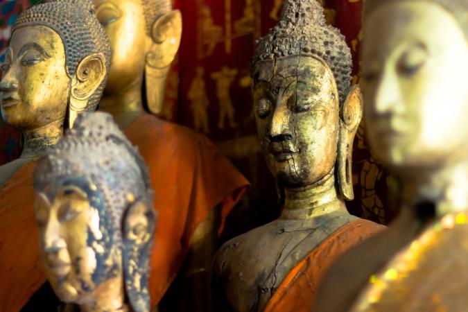 five golden buddha statues