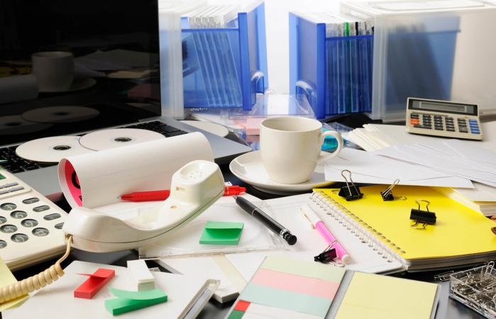 Cluttered office desk