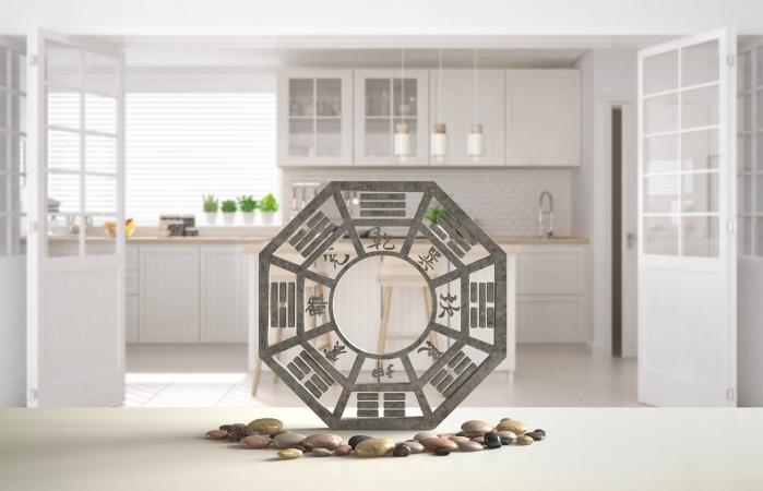 White table shelf with bagua and pebble stone