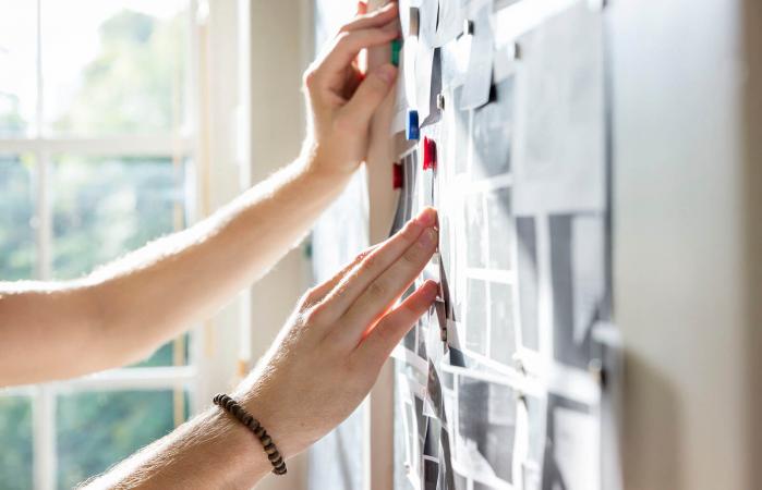 man creating an image board